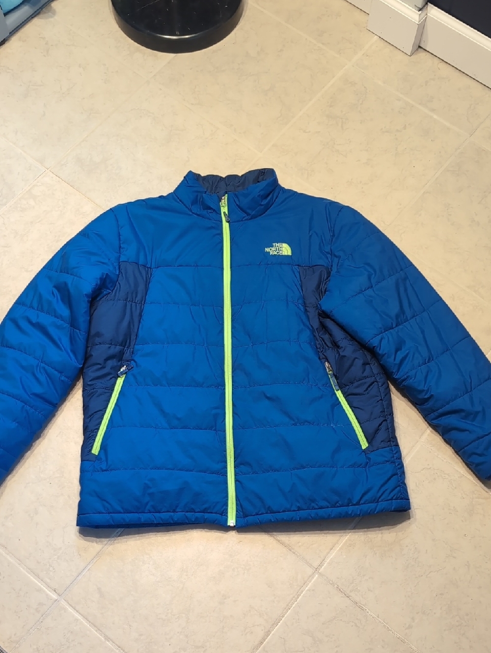 The North Face Kids Blue Puffer Jacket with Neon Green Accents